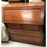 A modern Chinese cherry wood bureau,