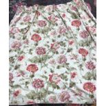 Three pairs of Laura Ashley Home cotton sateen curtains with a cream background and a design of