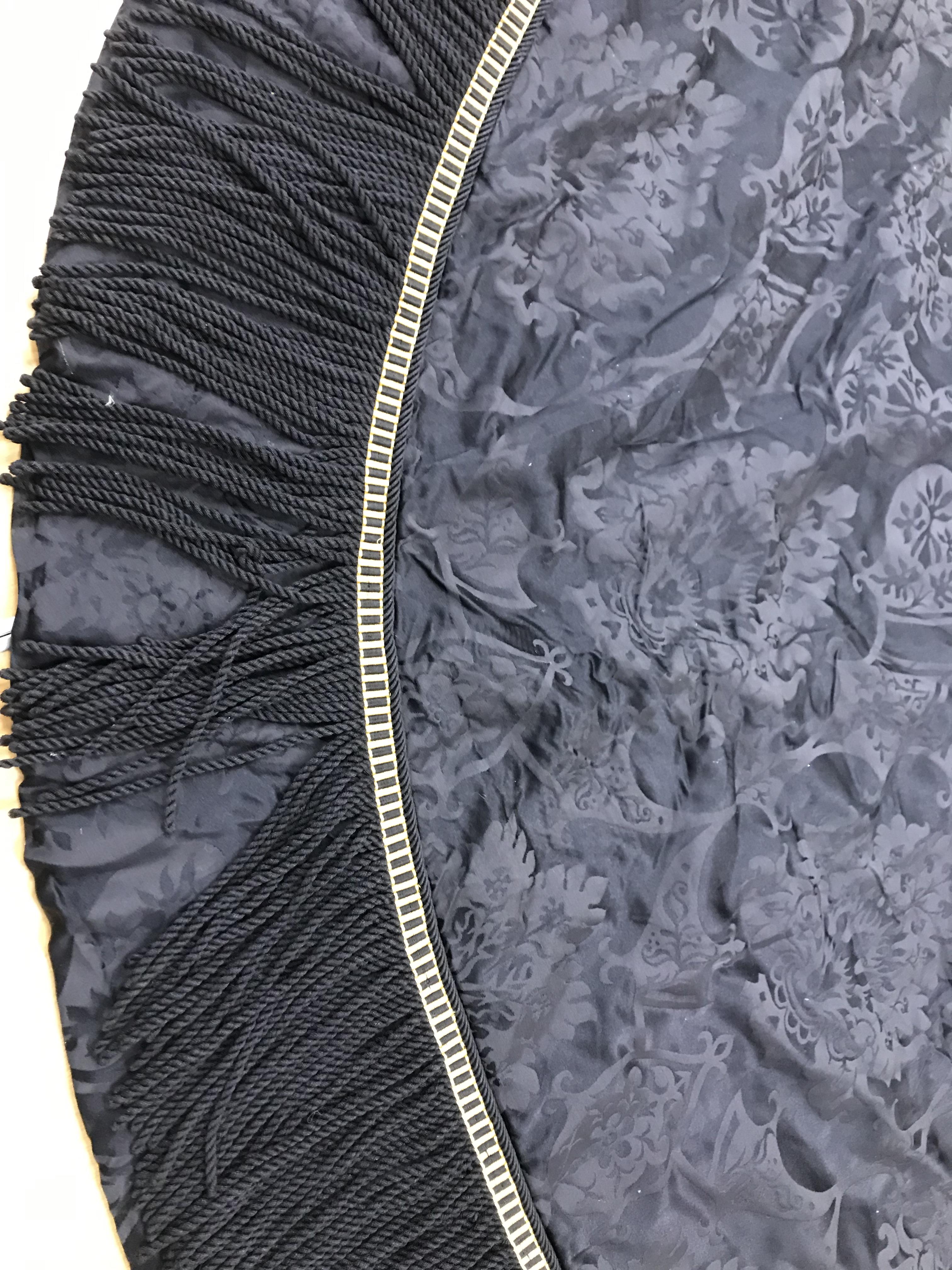 Four black damask circular tablecloths with black and gold braid and fringing, - Image 2 of 21