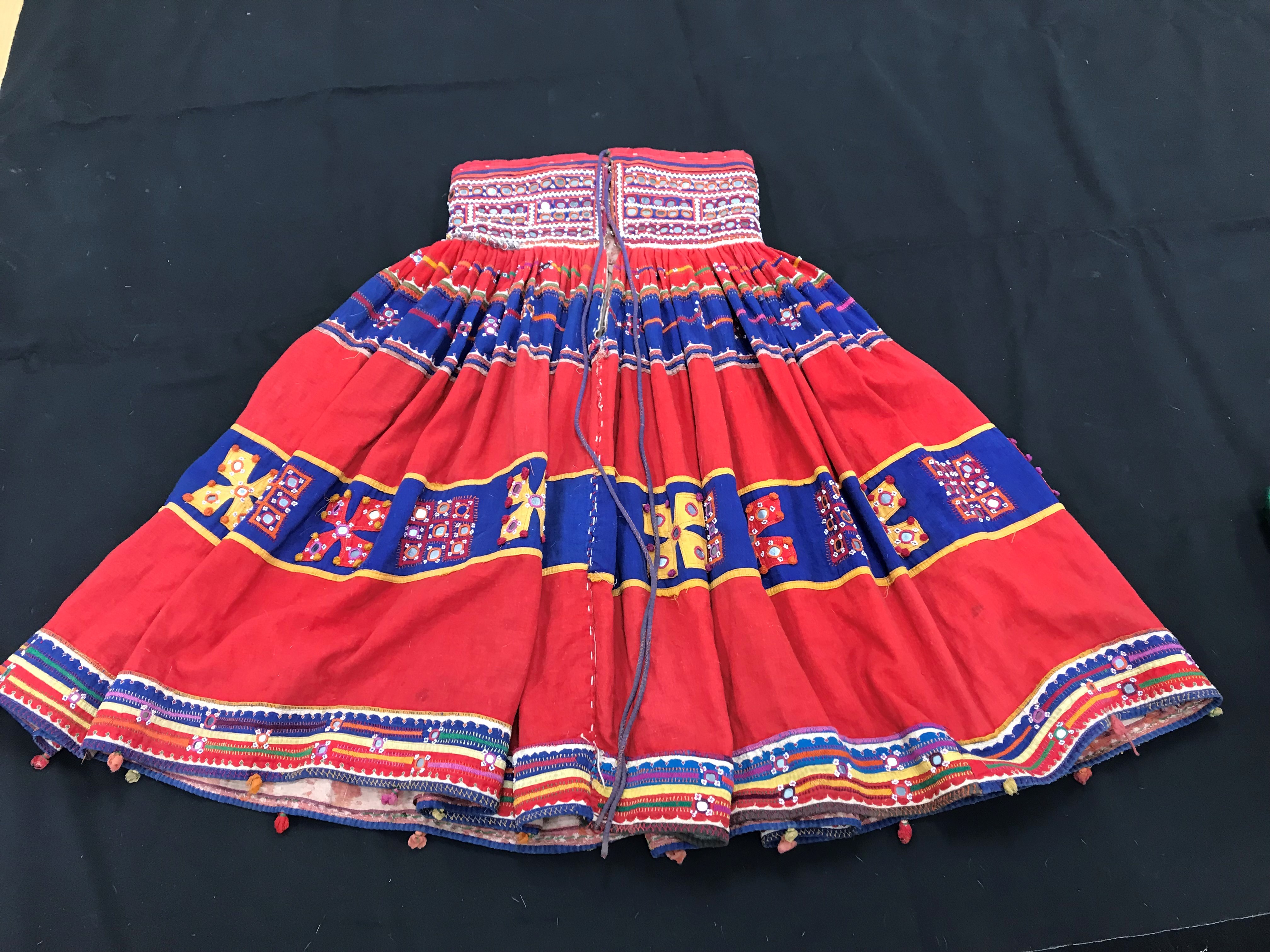 A Rajhistani skirt in red and blue stripes with overlaid embroidery and mirrored decorations, - Image 7 of 14