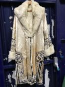 An early 20th Century silk coat,