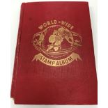A collection of stamp albums containing various stamps of the world