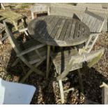 A slatted teak folding garden table, 100 cm diameter,