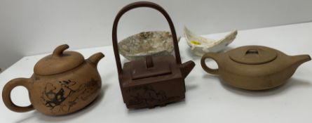 Three various Chinese Yi Xing teapots including a square form teapot with figural decoration and