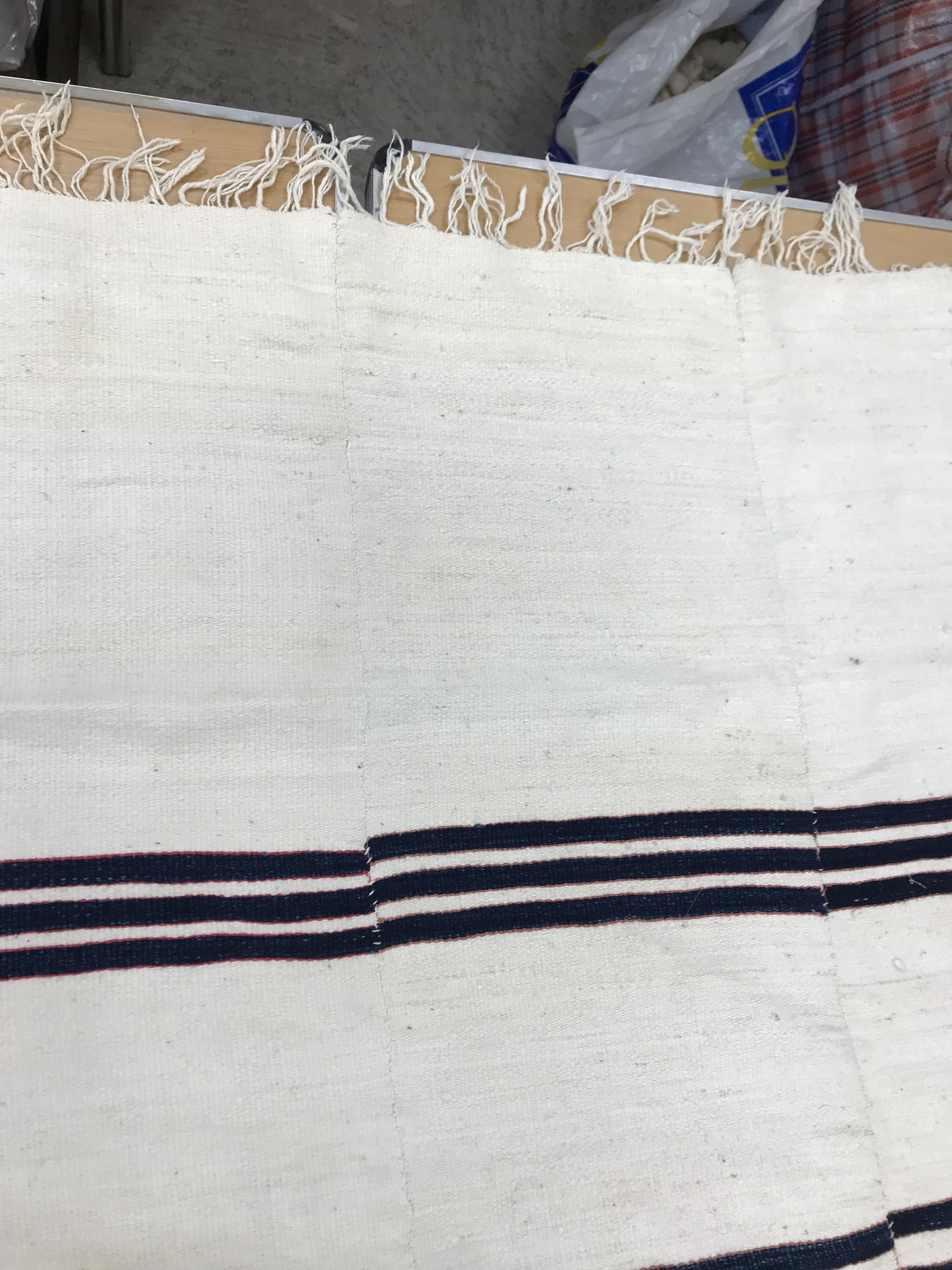A mid 20th Century Fulani blanket in cream with blue and yellow stripes constructed of hand woven - Image 11 of 18