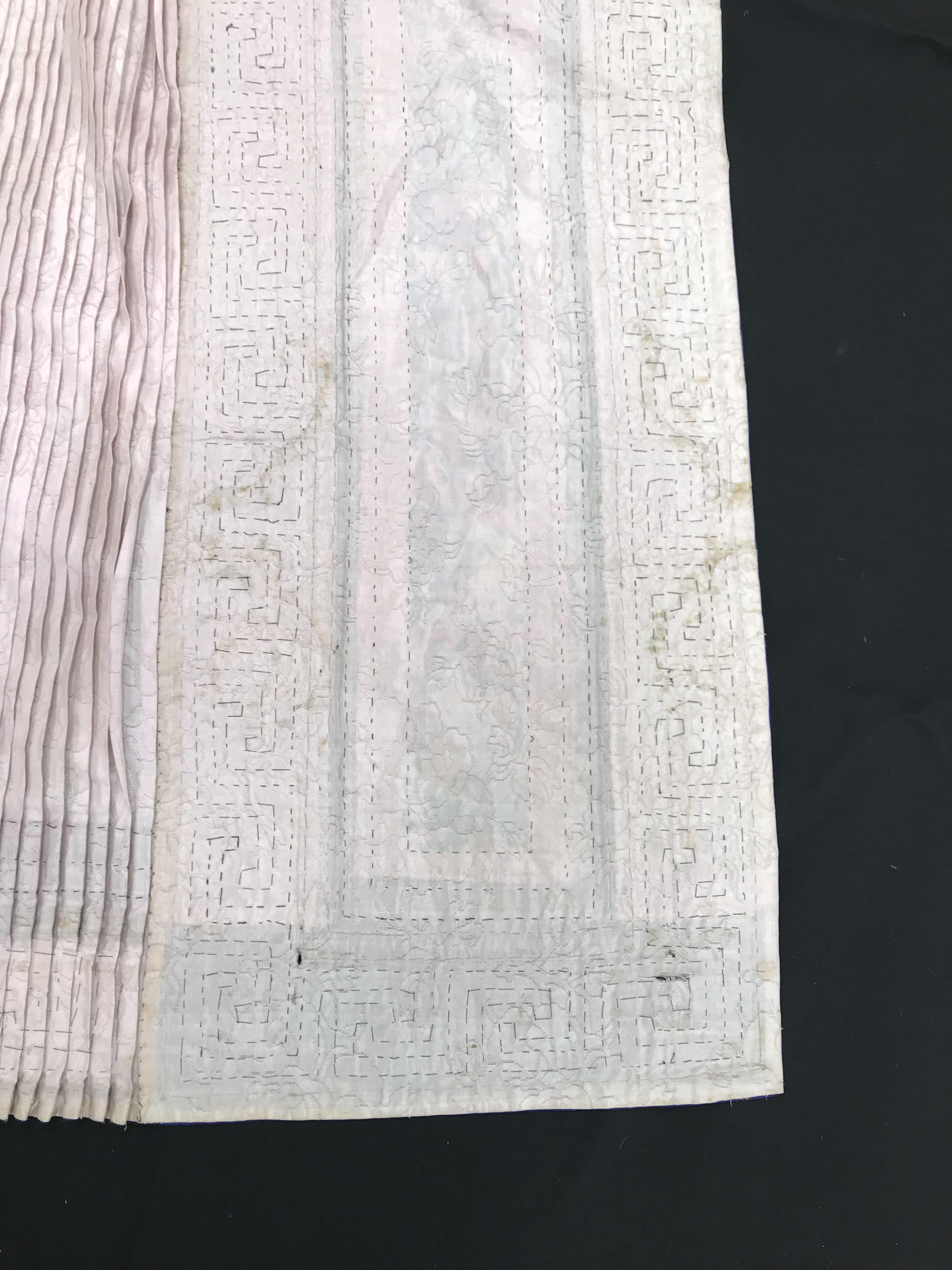 A Chinese silk skirt in two panels with a pink background overlaid with borders of Greek key type - Image 17 of 21