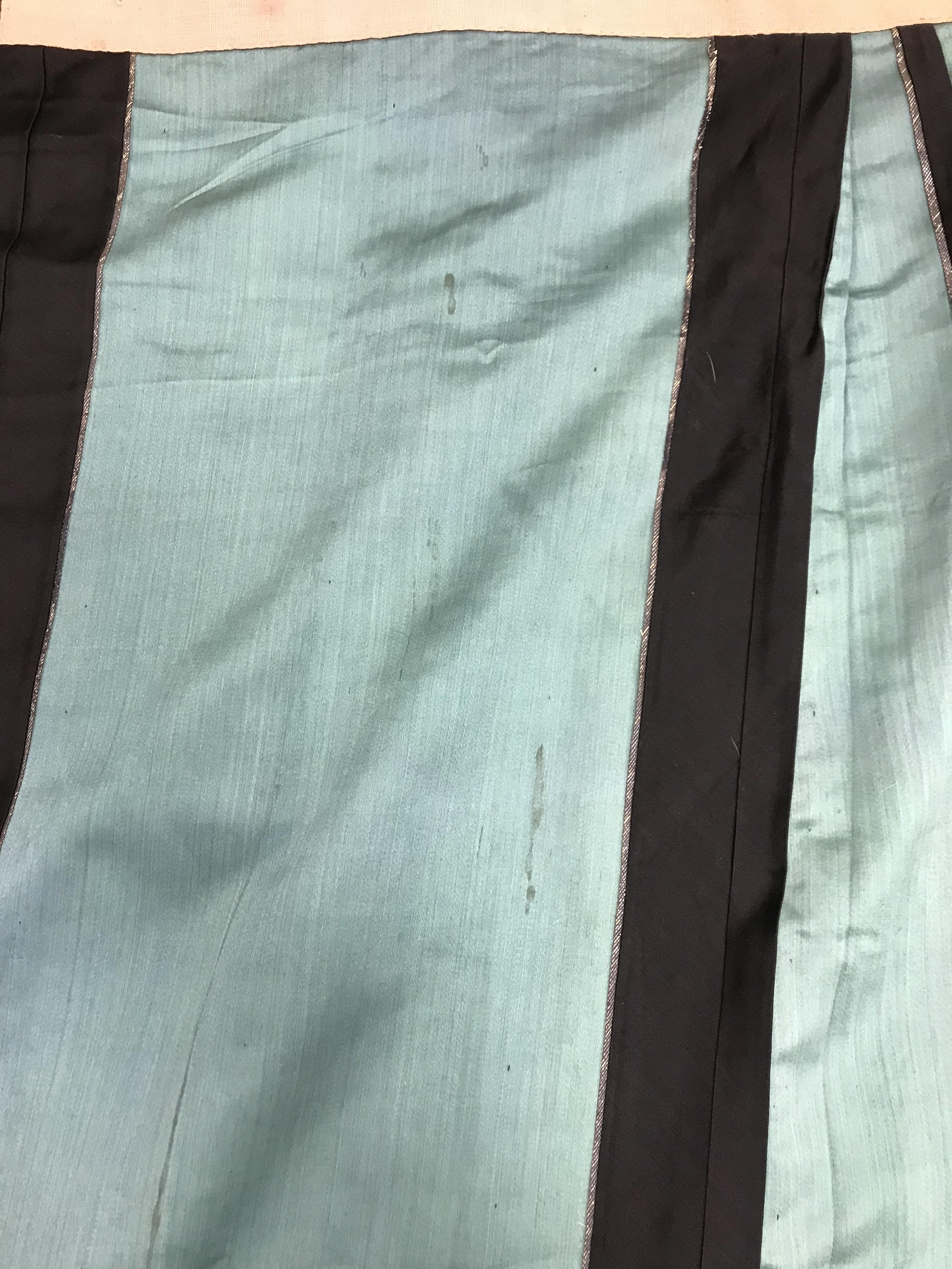 A Chinese teal silk skirt with black borders and a peach waistband, silk panels embroidered in blue, - Image 3 of 69