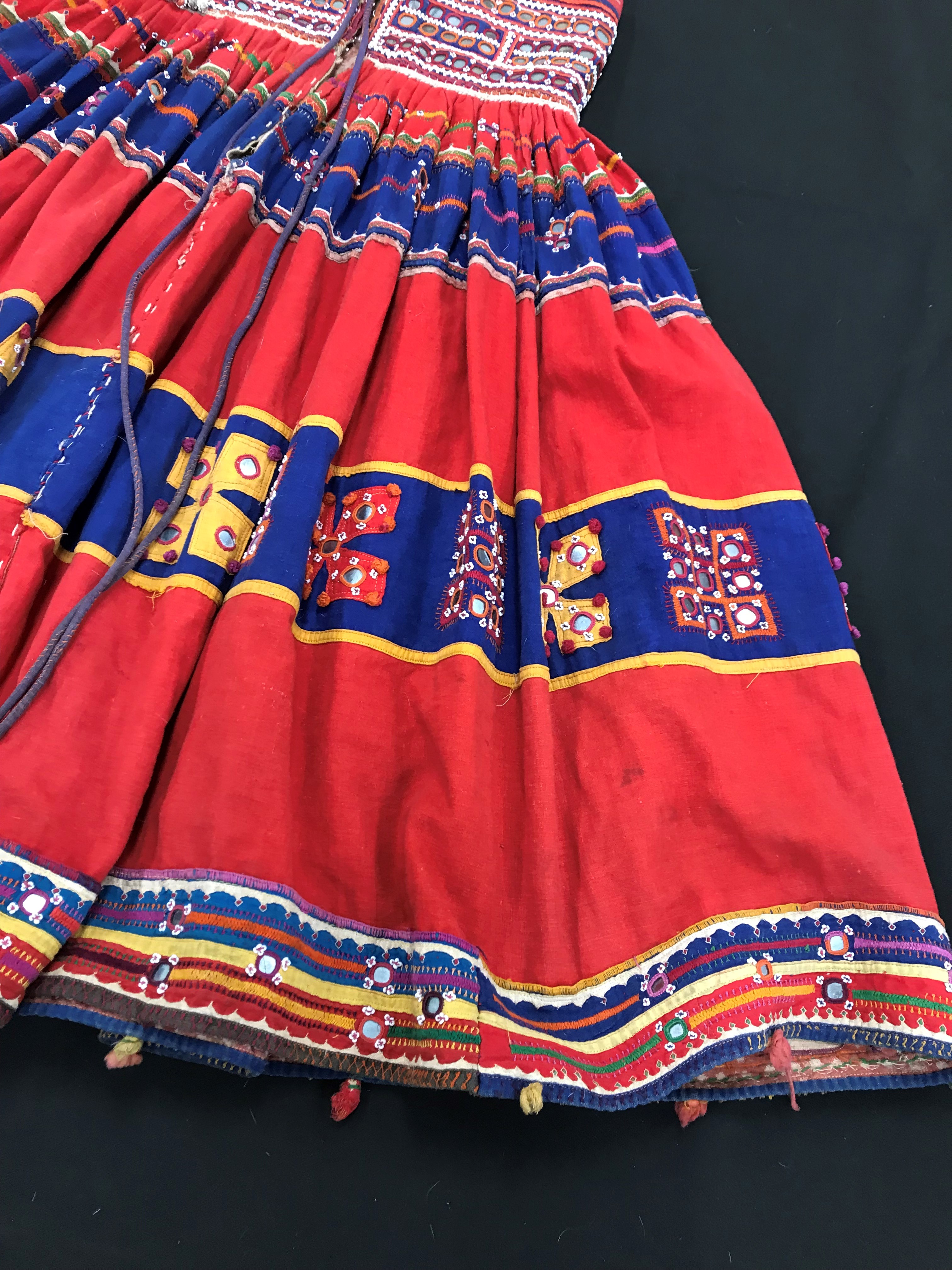 A Rajhistani skirt in red and blue stripes with overlaid embroidery and mirrored decorations, - Image 12 of 14