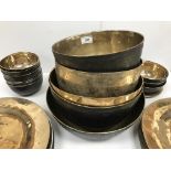 A collection of three beaten bronze deep bowls 28 cm diameter - 23.