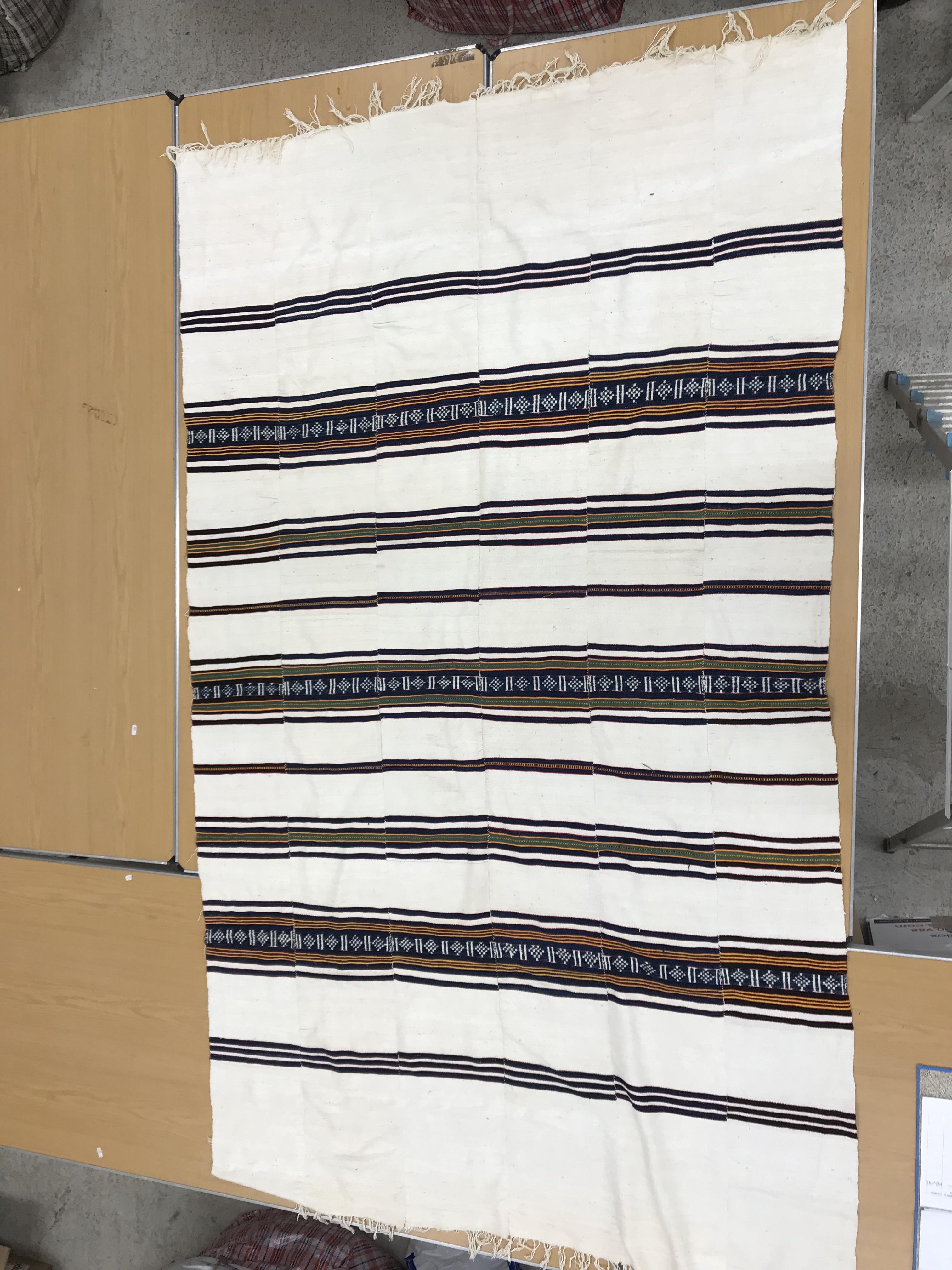 A mid 20th Century Fulani blanket in cream with blue and yellow stripes constructed of hand woven - Image 3 of 18
