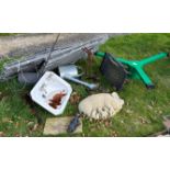 Two folding dog cages, galvanised watering can, pair of fire dogs, a cast iron fire grate,