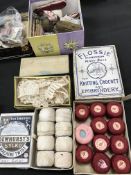 A box containing various vintage sewing materials and accessories to include a number of treenware