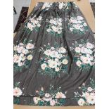 Two pairs of cotton satin curtains with green and pink floral design on a brown ground, lined,