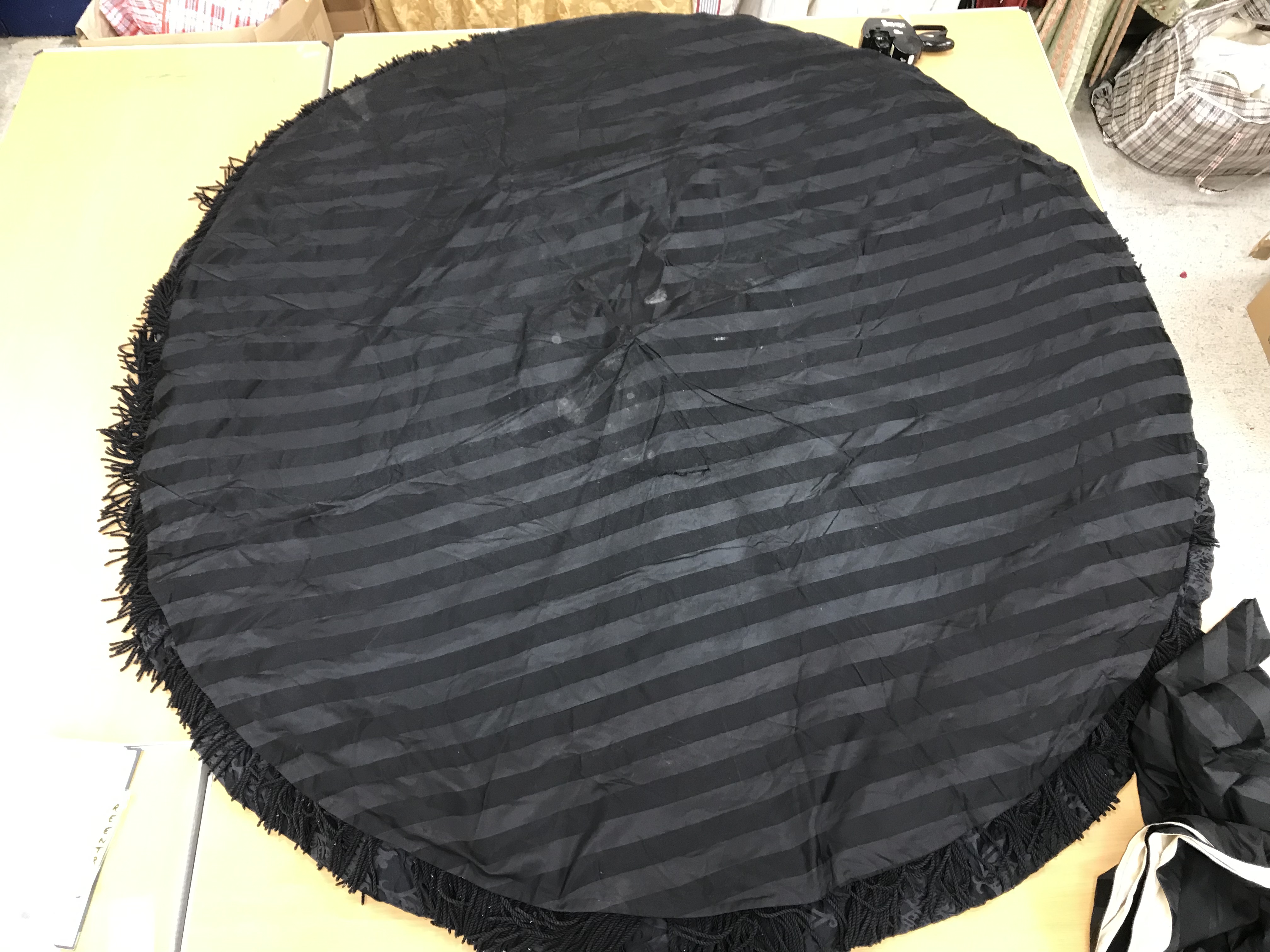 Four black damask circular tablecloths with black and gold braid and fringing, - Image 15 of 21