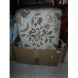 An upholstered square pouffe, raised on bun feet, assorted curtains for re-purposing,