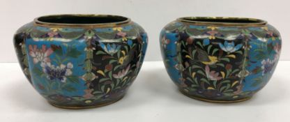 A pair of Chinese cloisonné jardinieres of oval squash form with all over floral pattern decoration