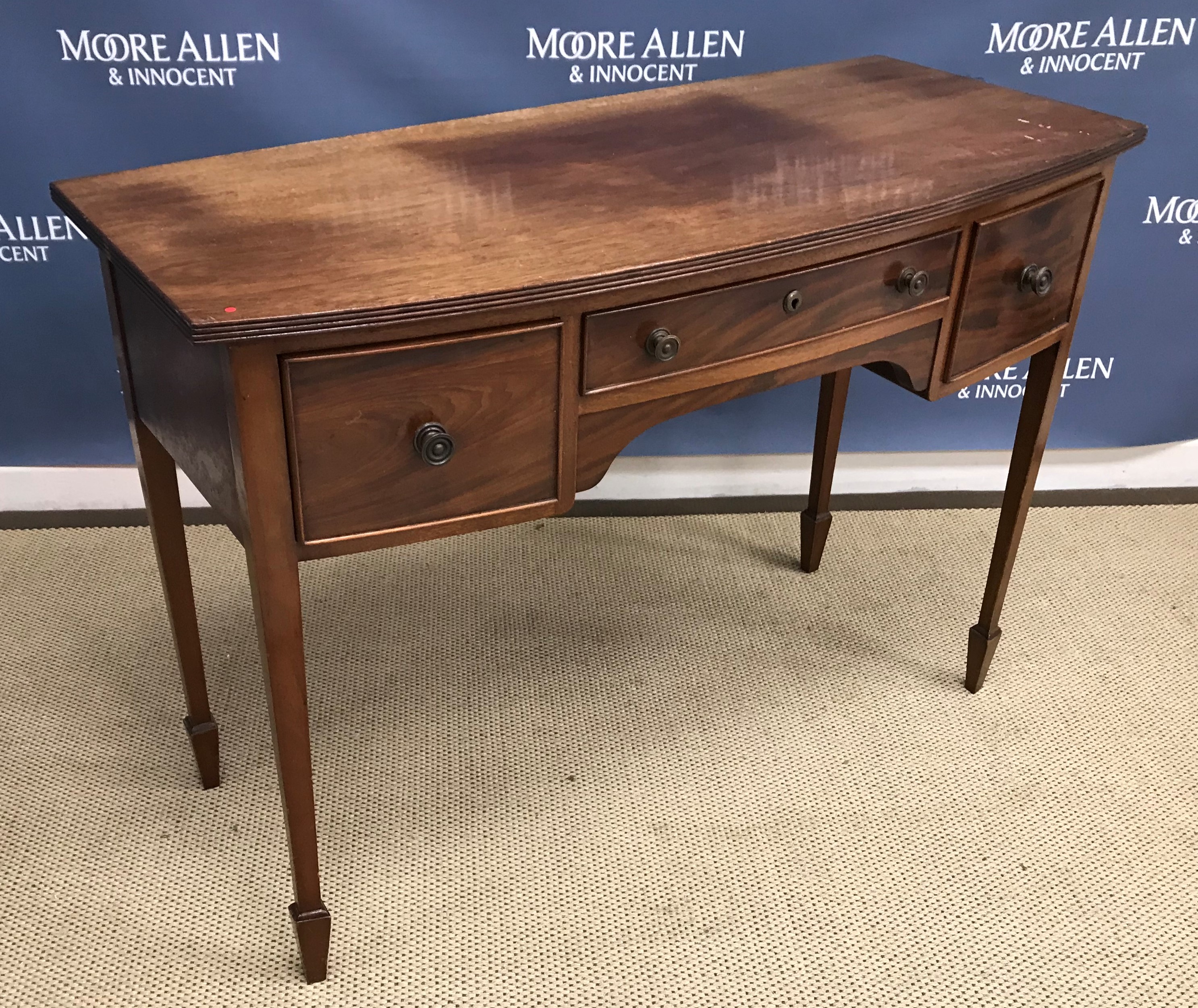 An Edwardian mahogany side table,