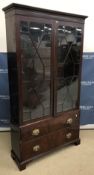 An Edwardian mahogany bookcase cabinet,