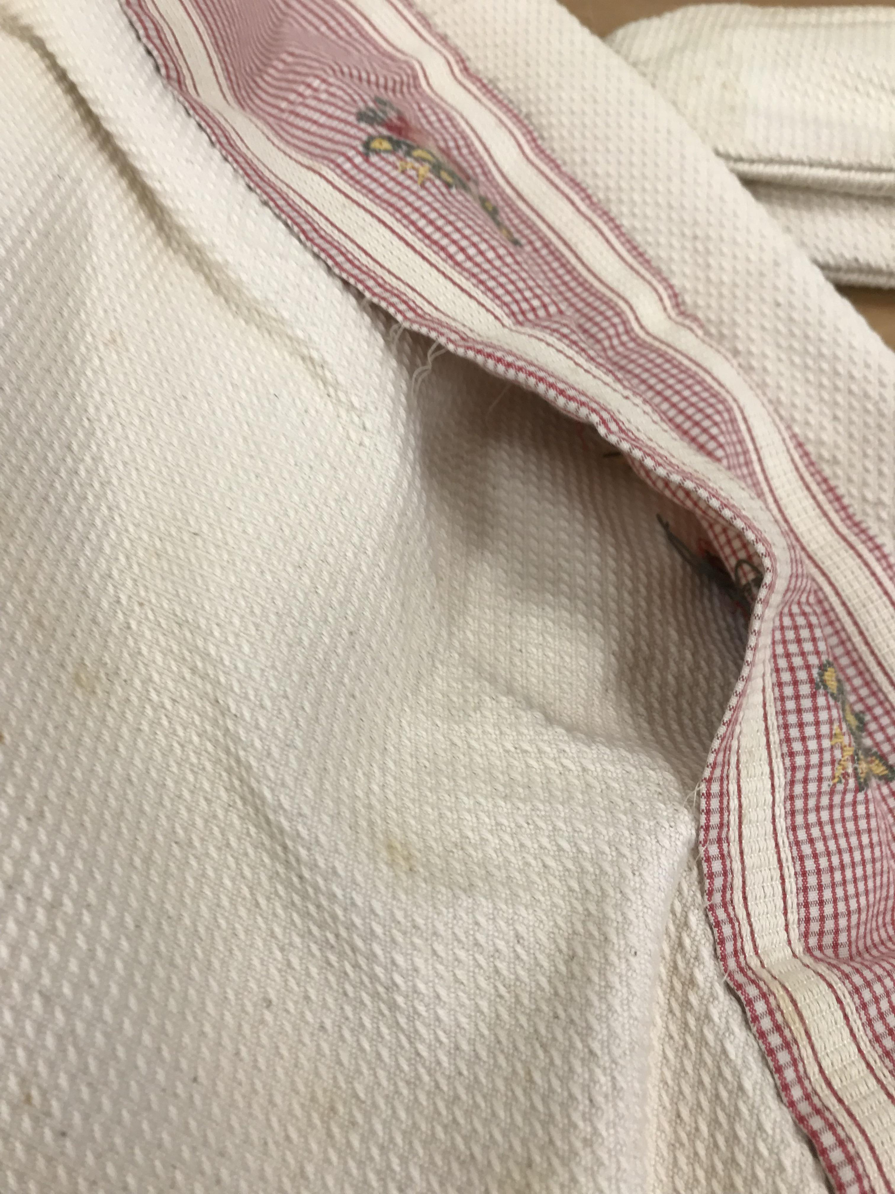 A pair of cotton waffle type curtains in cream with pink gingham and floral banding, interlined, - Image 2 of 28