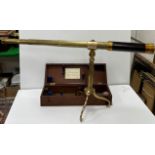 A Victorian lacquered brass cased and mahogany bound four draw telescope by T Cooke of York,