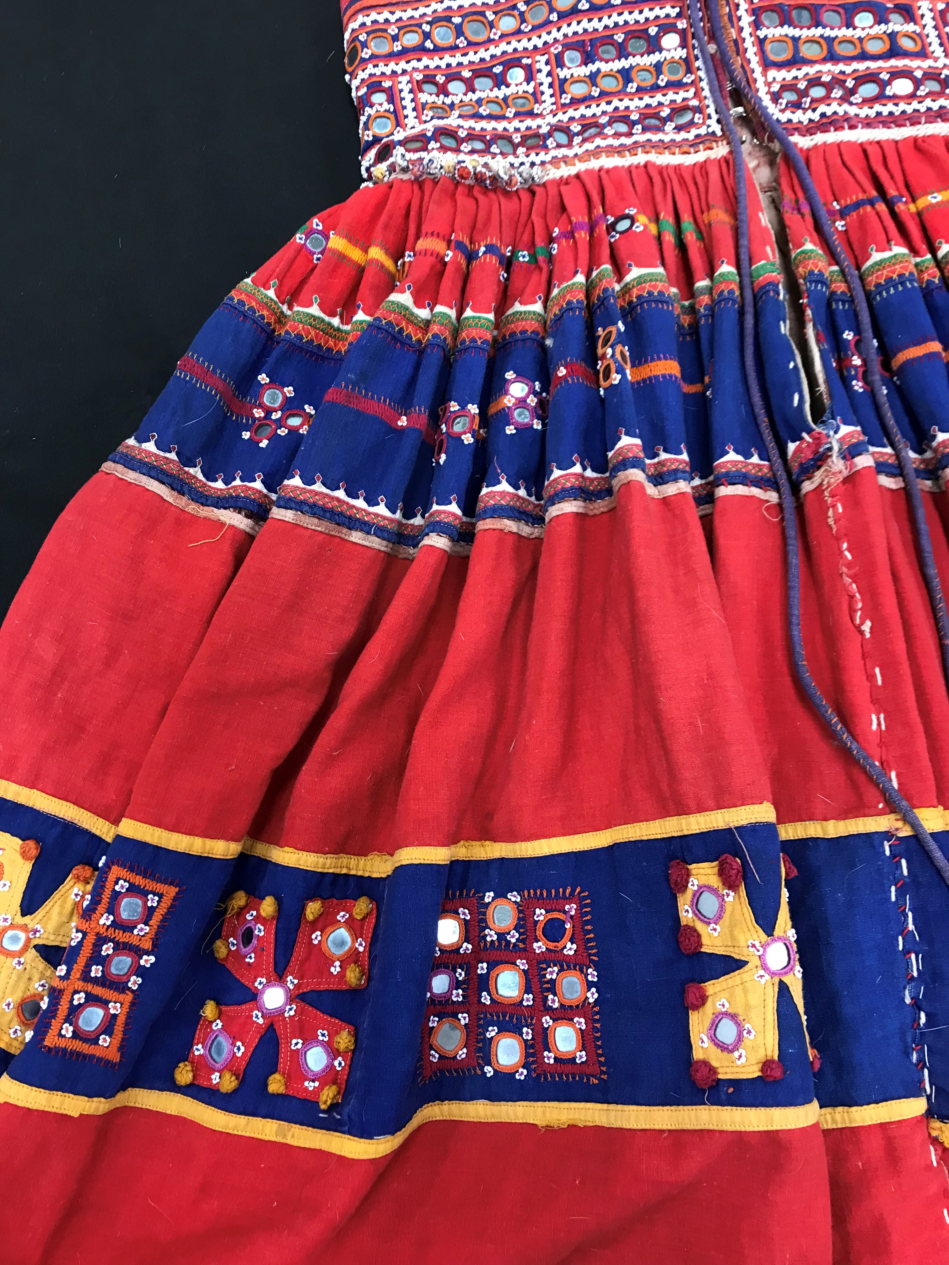 A Rajhistani skirt in red and blue stripes with overlaid embroidery and mirrored decorations, - Image 9 of 14