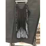 A black beaded cocktail dress, together with a black beaded and sequinned top by Batik,