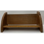 An oak book trough of plain form with mouse motif to one end by the workshops of Robert Thompson of