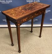 A 19th Century Dutch mahogany and marquetry inlaid fold over card table,