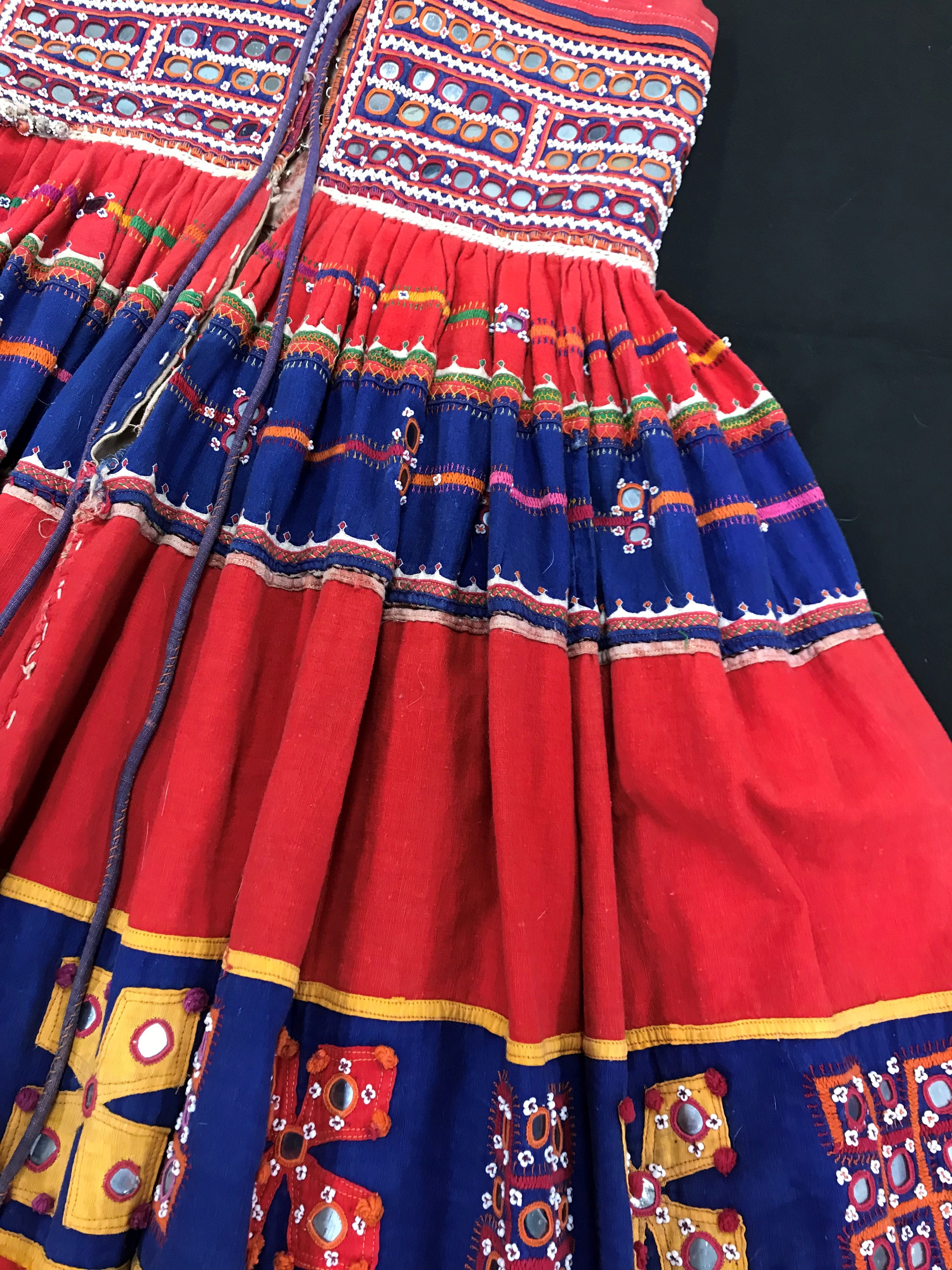 A Rajhistani skirt in red and blue stripes with overlaid embroidery and mirrored decorations, - Image 11 of 14