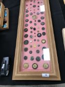 Three frames of mainly figurative buttons depicting animals, people, ships, flowers, etc,