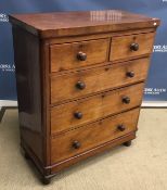 A Victorian mahogany chest of two short over three long graduated drawers with turned knob handles