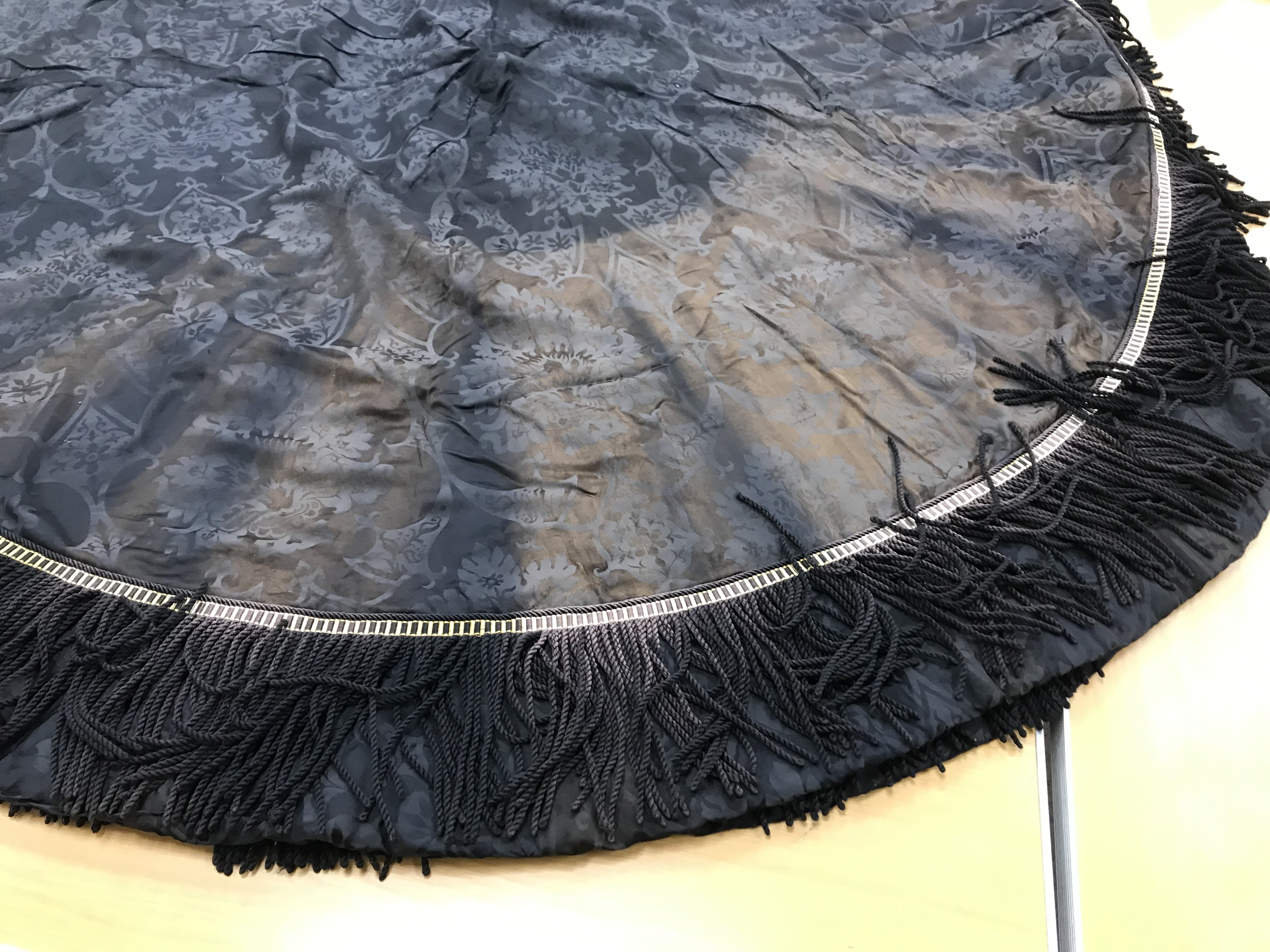 Four black damask circular tablecloths with black and gold braid and fringing, - Image 6 of 21