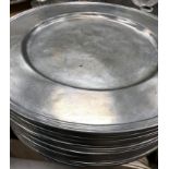 A set of 24 Giorgio Tabellini La Bottega del Petro pewter plates, 32.