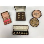 Two sets of six early 20th Century photographic print buttons,