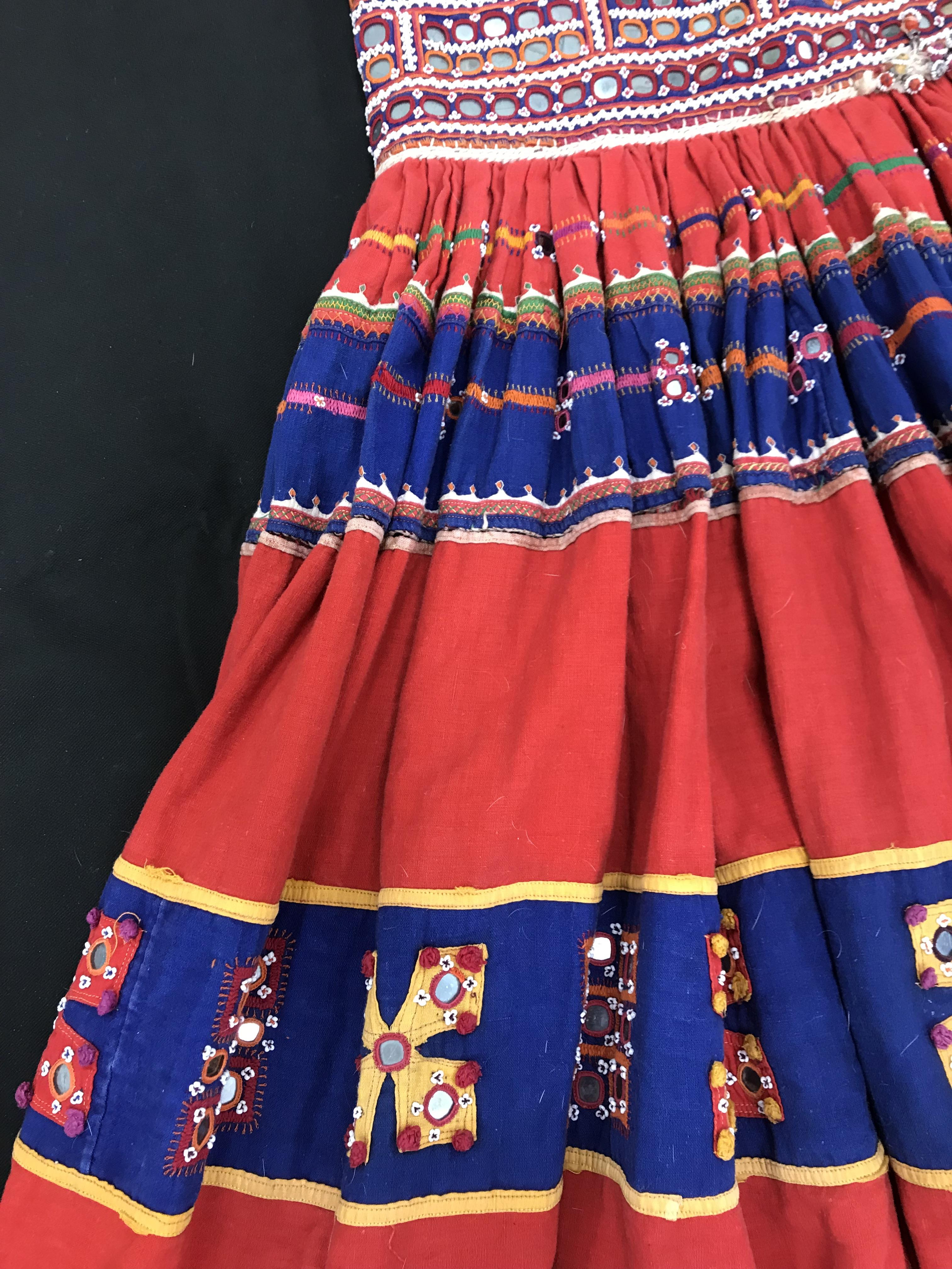 A Rajhistani skirt in red and blue stripes with overlaid embroidery and mirrored decorations, - Image 3 of 14