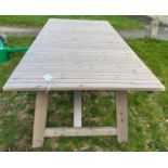 A modern slatted folding trestle end garden table, 319.