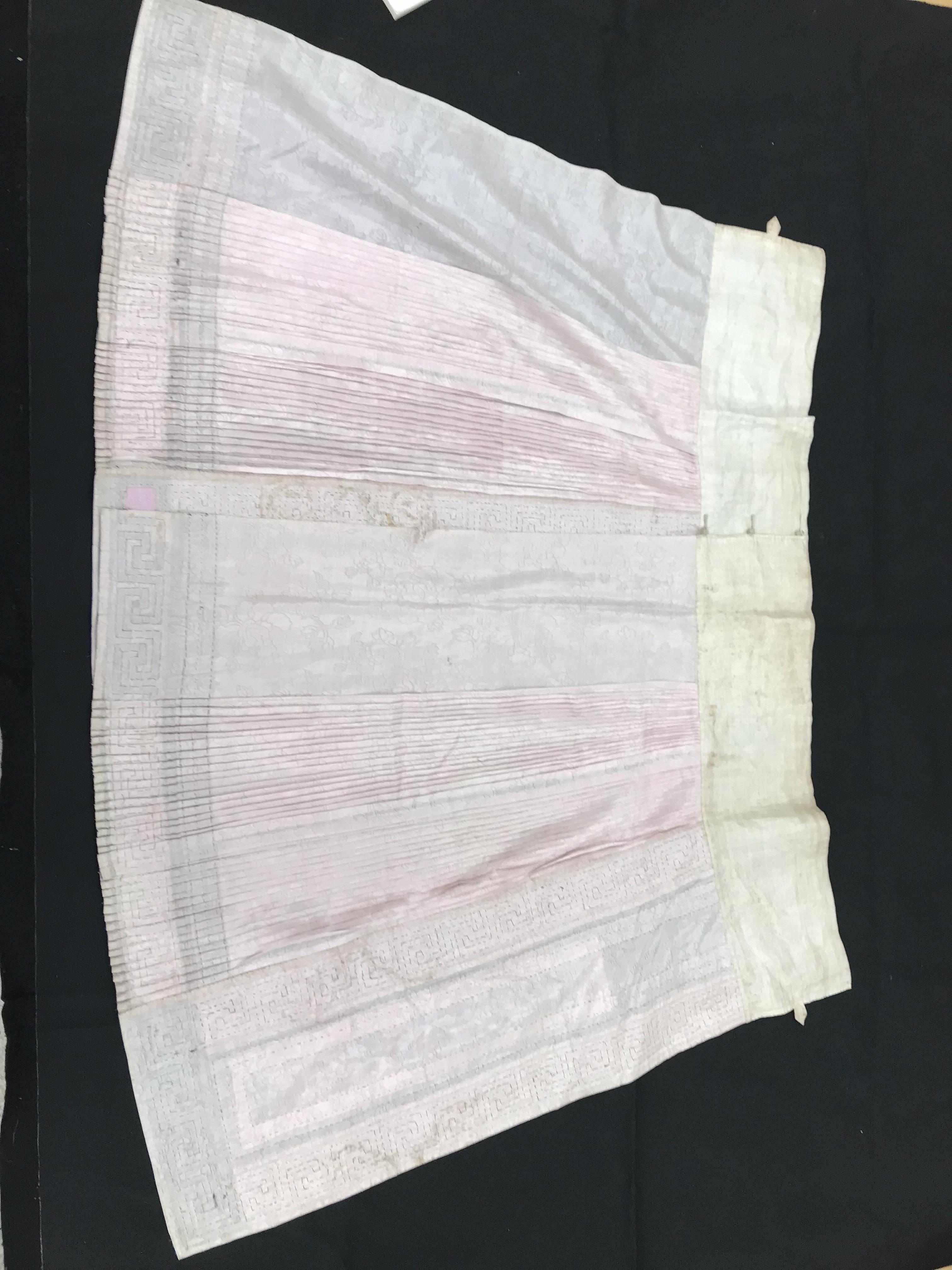 A Chinese silk skirt in two panels with a pink background overlaid with borders of Greek key type - Image 16 of 21