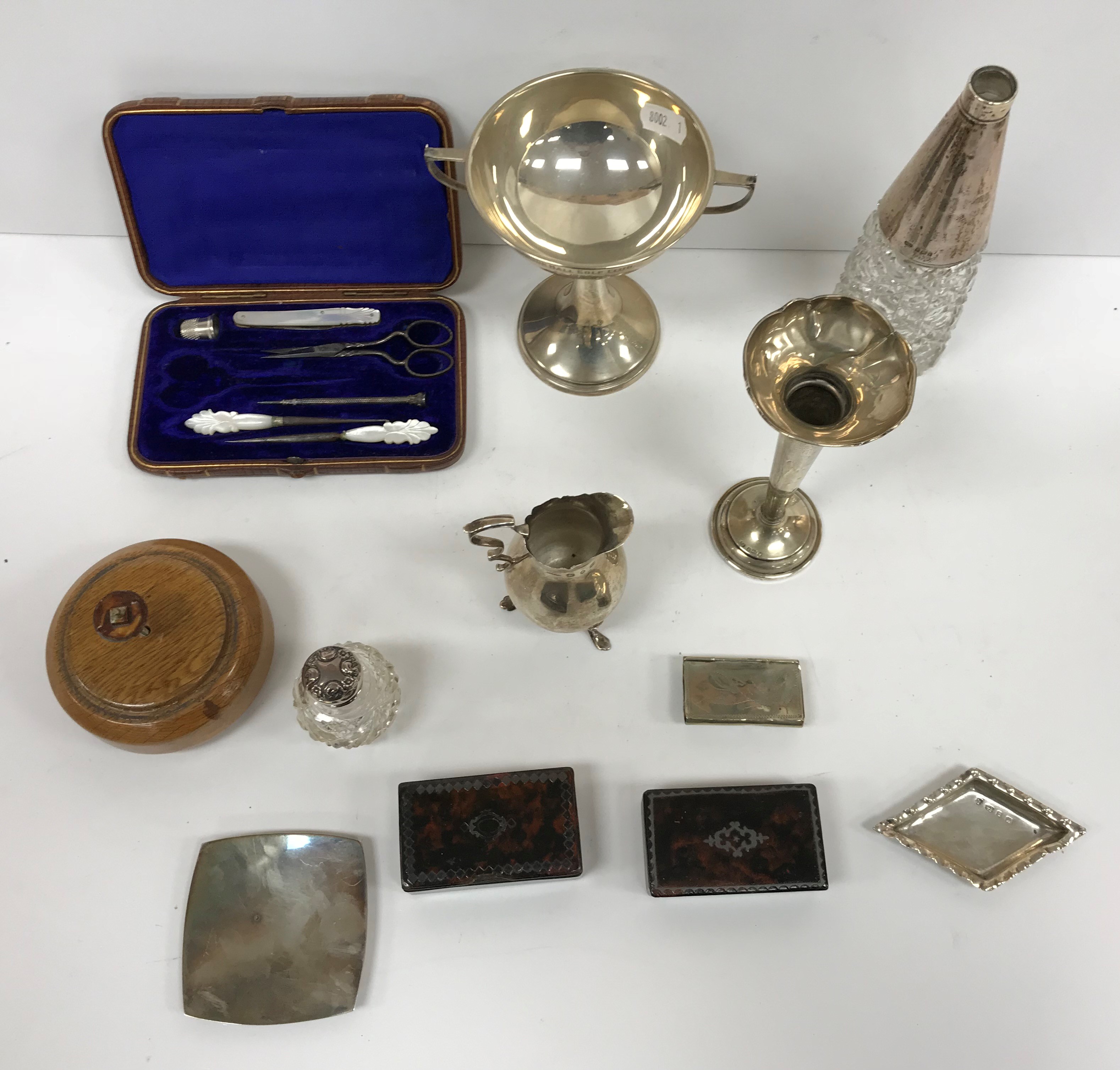 A box of small silver wares to include a baluster shaped cream jug on three scroll feet, - Image 2 of 2