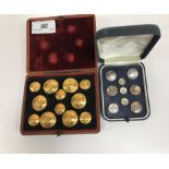 A set of brass buttons depicting lyre type instruments,
