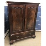 A late George III mahogany linen press,