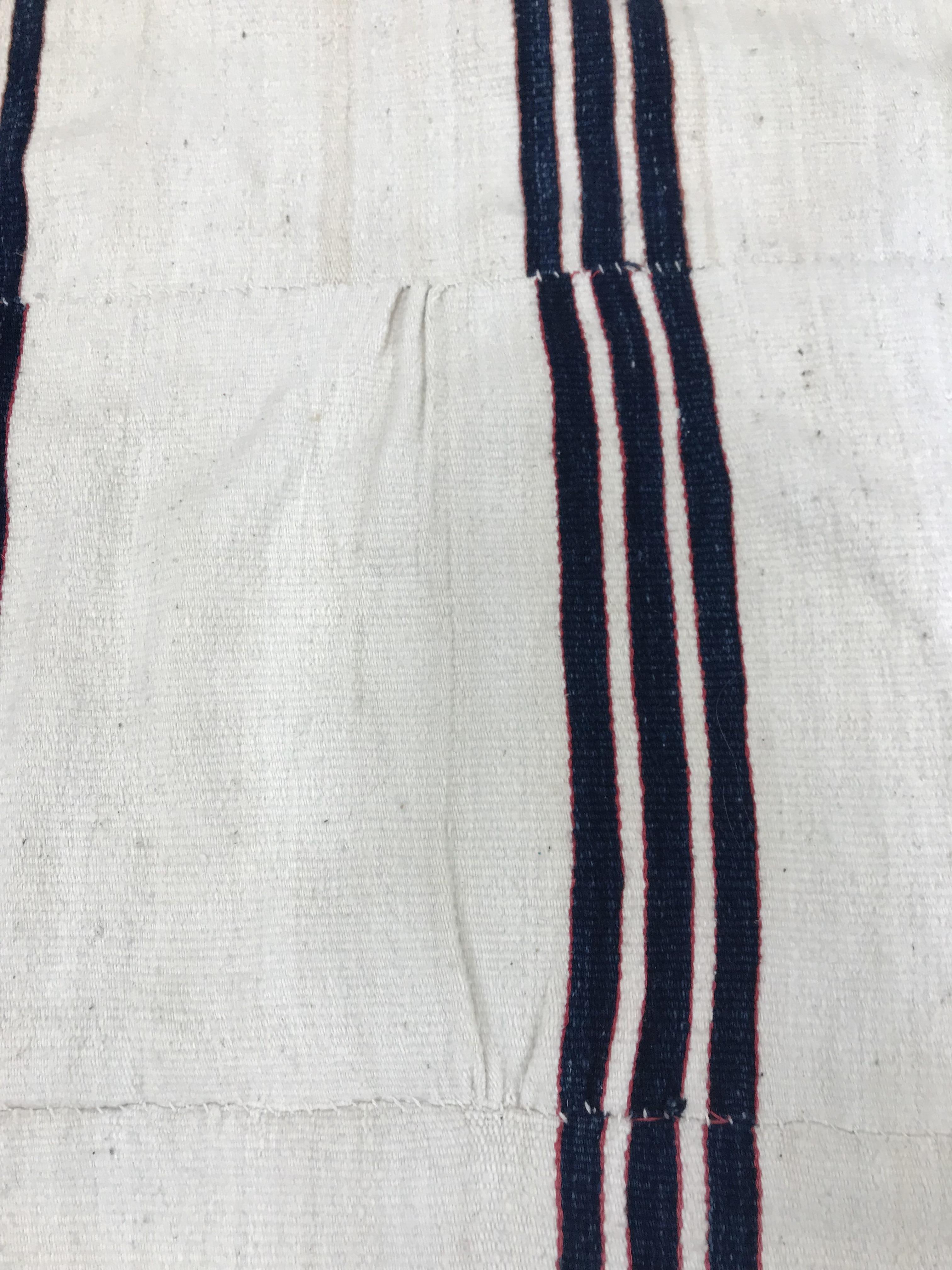 A mid 20th Century Fulani blanket in cream with blue and yellow stripes constructed of hand woven - Image 5 of 18