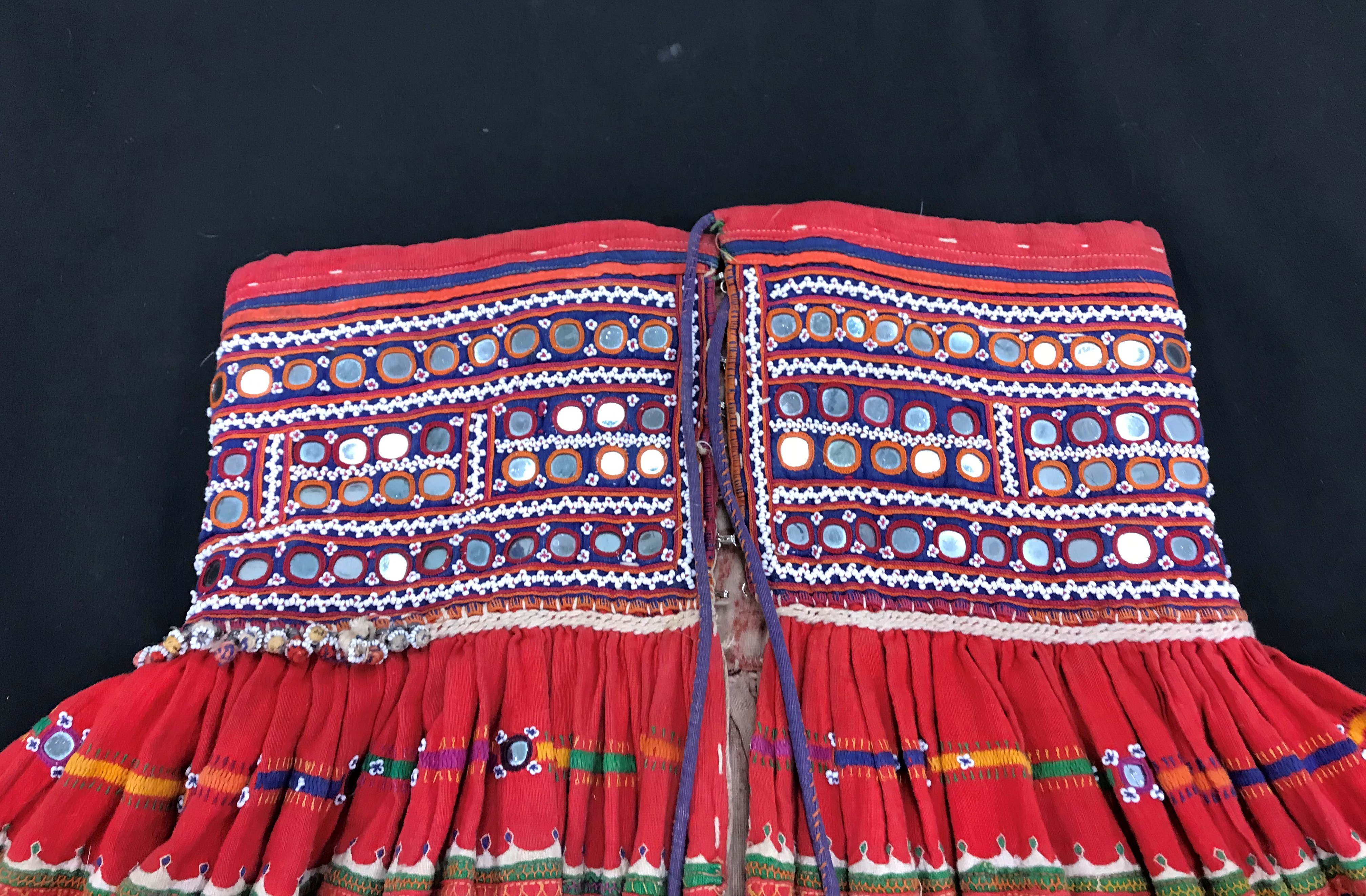 A Rajhistani skirt in red and blue stripes with overlaid embroidery and mirrored decorations, - Image 8 of 14