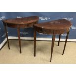 A pair of modern mahogany and satinwood strung demilune side tables in the Georgian style,