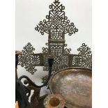 A collection of various metal wares to include an Eastern white metal pierced cross 74.
