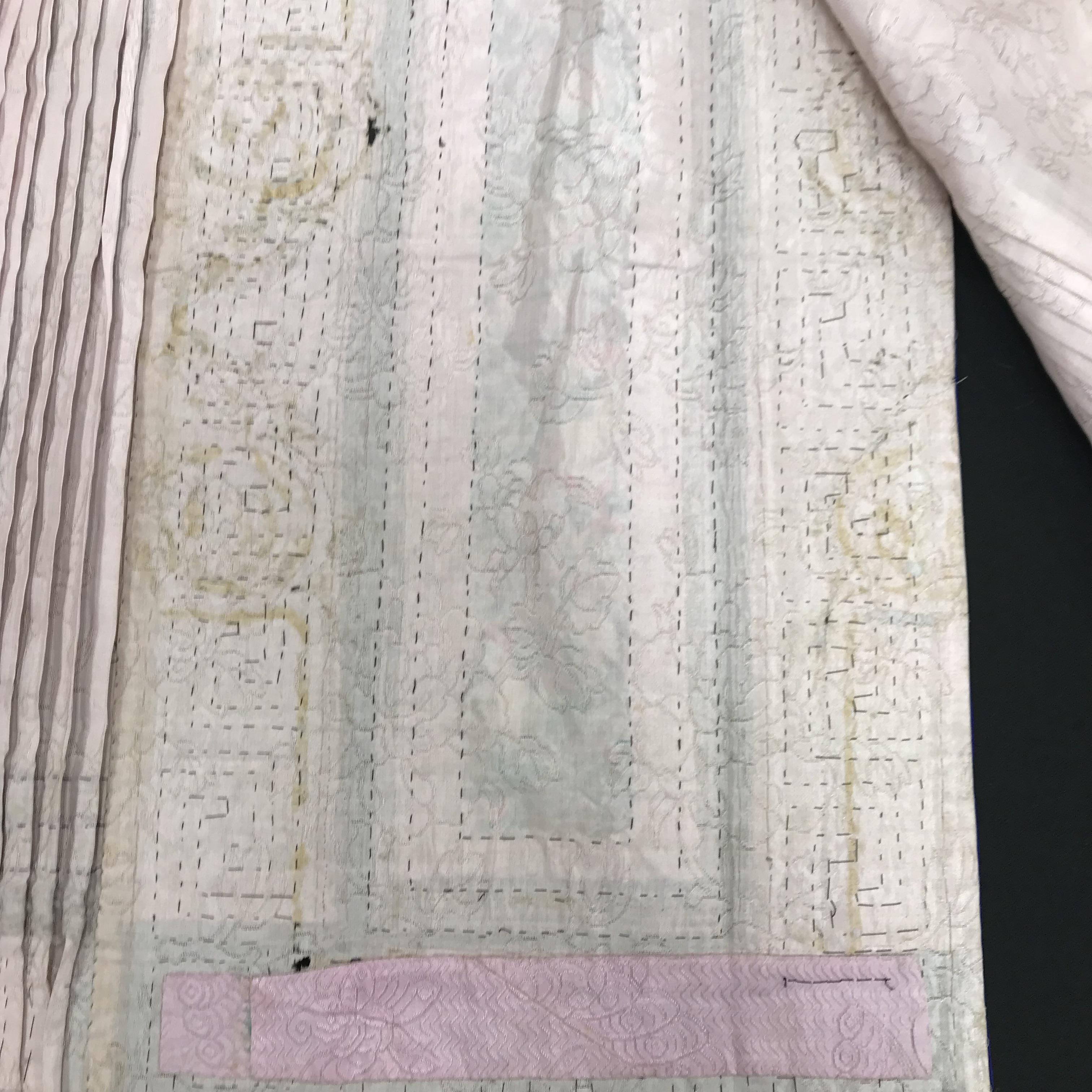 A Chinese silk skirt in two panels with a pink background overlaid with borders of Greek key type - Image 19 of 21
