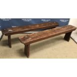 A pair of stained pine bench seats,