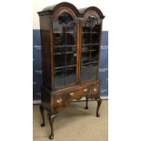 A 20th Century walnut display cabinet in the early 18th Century manner,