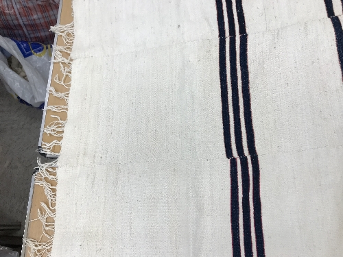 A mid 20th Century Fulani blanket in cream with blue and yellow stripes constructed of hand woven - Image 12 of 18