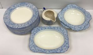 A collection of Art Deco style Royal Doulton 'Envoy' dinner wares including two oval serving