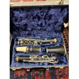 An F Buisson Dallas 90 clarinet with hard case and a vintage mandolin (un-named)